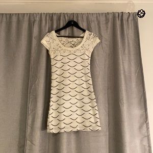 White and black dress size small.